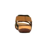 Sandalia de mujer con diseño cerrado en la parte delantera, combinando cuero verde oliva y cuero marrón claro. Posee tira ajustable con velcro en el talón y suela de goma con plantilla de corcho.