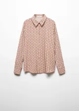 Camisa de manga larga con cuello camisero y cierre de botones frontal. Estampado geométrico en tonos terracota y blanco.