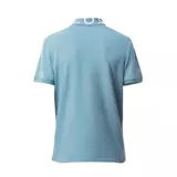 Polo celeste de piqué de algodón con cuello jacquard con la inscripción Lacoste en blanco.