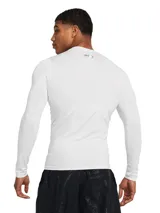 Remera de compresión Under Armour HeatGear de manga larga, color negro con logo blanco en el pecho.