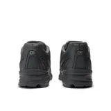 Championes New Balance 740 unisex, color gris oscuro con detalles en negro y logo "N" en plateado.