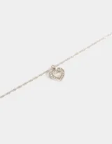 Cadena dorada con dije de corazón calado con strass.