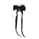 Broche para el pelo con forma de moño negro y tiras largas.