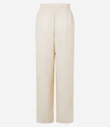 Pantalón recto de chiffon color crema con cintura elástica, lazo ajustable y textura de encaje.