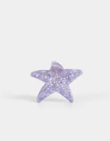 Broche con forma de estrella de mar color lila con incrustaciones de strass.