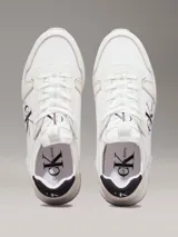 Zapatillas deportivas Calvin Klein Jeans color blanco con logo de la marca en negro en el lateral.
