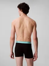 Pack de tres bóxer brief Calvin Klein de microfibra elástica color negro con cintura elástica celeste con logo de la marca.