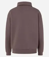 Saco femenino cerrado de algodón con felpa más sostenible, color beige. Presenta cuello polo con abotonado parcial, manga larga y bajo ajustado.