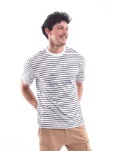 Remera de algodón de rayas blancas y negras con estampado gráfico en el frente.