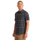 Camisa de manga corta con estampado geométrico en tonos azul, gris y negro.