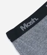 Calzoncillo bóxer gris melange de algodón con elástico negro en la cintura con la marca Mash en gris.