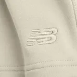 Short New Balance Athletics color crema, de corte recto, con cintura elástica ajustable con cordón y logo bordado en la parte inferior izquierda. Confeccionado en tejido de felpa francesa de algodón.