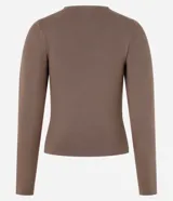 Blusa color beige de jacquard con cuello redondo y mangas largas.