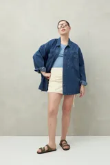 Musculosa blanca de viscosa con escote redondo y sisas amplias.