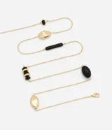 Collar largo dorado con abalorios de resina negra y dorada de diferentes formas.