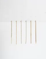 Set de tres pares de aros colgantes largos de metal dorado y plateado con strass.