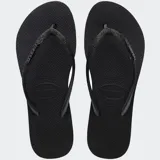 Ojotas Havaianas Slim Flatform Sparkle color negro, con plataforma de 2.5 pulgadas y tiras con glitter.