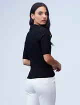 Buzo de tejido acanalado con cuello solapa y escote en V, de la marca Rio & Rian.