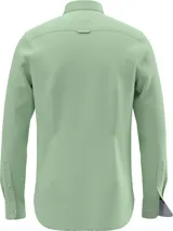 Camisa Tommy Hilfiger de corte slim, color verde claro, confeccionada en tejido dobby de algodón orgánico con tecnología TH Flex. Presenta cuello abotonado, puños redondeados con dos botones y logo bordado en el pecho.