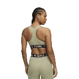 Top deportivo Puma color verde oliva con logo en el centro y banda elástica inferior con la marca Puma en negro y blanco.