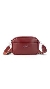 Bandolera color beige con apertura central con cierre, bolsillo frontal con logo "Lincoln's Since 1984" y correa de galón a tono, larga y regulable.