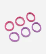 Set de seis gomitas de pelo elásticas, gruesas y sin costura, en colores rosa y lila.