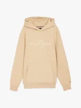 Buzo con capucha Tommy Hilfiger color beige, con logo bordado en el pecho y bandera de la marca en el puño.