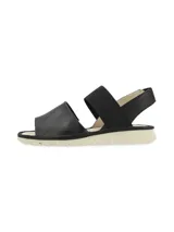 Sandalias bajas color dorado con dos tiras anchas, una sobre los dedos y otra elástica en el talón.