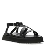 Sandalias blancas con tiras finas cruzadas y suela track color negro.