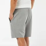 Bermudas deportivas grises de punto de piqué con cintura elástica y bolsillos laterales.