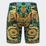 Calzoncillos tipo bóxer PSD con estampado de guepardo en tonos turquesa, negro y dorado. Cintura elástica turquesa con logo de la marca.