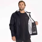 Campera impermeable con capucha Merrell Fallon Rain Shell para hombre, color negro, con cierre frontal, bolsillos laterales con cierre y logo de la marca estampado en el pecho. Ideal para actividades al aire libre.