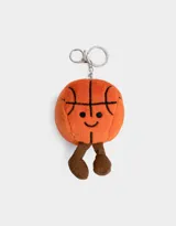 Llavero con dije de peluche en forma de pelota de básquet naranja con detalles bordados y piernas de peluche marrón.