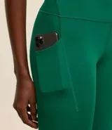 Calza legging deportiva color verde agua, de microfibra, con cintura ancha y bolsillos laterales.