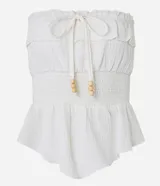 Blusa sin breteles color blanco, confeccionada en crepé con textura crinkle y lastex en la cintura.