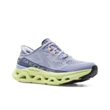 Championes deportivos Skechers Hands Free Slip-ins Glide-Step Altus, color lila con detalles en verde y naranja. Diseñados con tecnología Heel Pillow, capellada de malla Stretch Fit, plantilla Air-Cooled Memory Foam y entresuela Glide-Step.