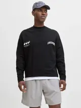 Buzo negro de manga larga con cuello redondo y calce oversize cropped. Presenta un estampado grande en la espalda con texto en blanco que incluye "CORE", "1990", "Functional Aesthetics", "CoreSport©" y tres estrellas.