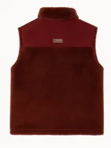 Chaleco marrón con cuello alto, cierre frontal con cremallera, dos bolsillos delanteros y forro de tela suave.