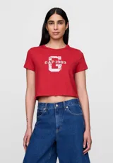 Remera corta verde con estampado de texto en blanco que dice 'New York Gap Pickle Ball 9'.