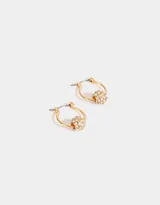 Aros argolla plateados con dije de esfera cubierta de strass.