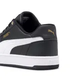 Championes Puma Caven 2.0 unisex, color blanco con detalles en marrón y negro. Zapatillas de estilo retro inspiradas en el baloncesto de los años 80, con plantilla SoftFoam para mayor comodidad.