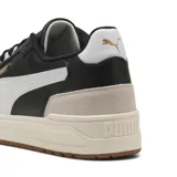 Championes Puma Shuffle Downtown OG de cuero sintético negro con detalles en blanco y beige.