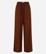 Pantalón pantalona marrón de viscolino, con cintura elástica, bolsillos laterales y lazo ajustable en la cintura.