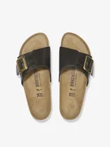 Sandalias Birkenstock Catalina color negro con hebilla dorada ajustable.