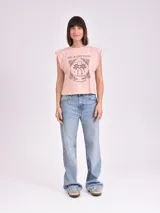 Remera color rosa con estampado de palmeras y texto "Sur la Cote D'Azur France Saint Jean Cap Ferrat".