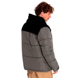 Campera puffer amarilla con cuello alto y parte superior en pana negra. Tiene cierre frontal con velcro, bolsillos laterales con cierre y puños ajustables.