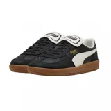 Championes Puma Palermo Premium, color negro con detalles en blanco y suela marrón.