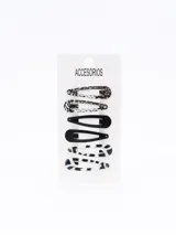 Pack de seis hebillas para el pelo tipo sapitos, con diseños variados: dos plateadas con textura, dos negras lisas y dos con estampado animal print en blanco y negro.