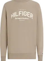 Buzo color beige de cuello redondo, con logo Tommy Hilfiger estampado en el pecho.