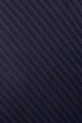 Bombacha de bikini tiro alto confeccionada en tejido acanalado negro con cintura blanca en contraste.